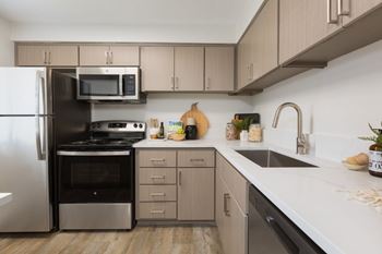 Brand new hardware and plumbing fixtures including pull-down gooseneck kitchen faucet